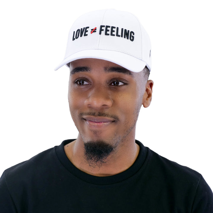 Love is Not a Feeling Cap - White