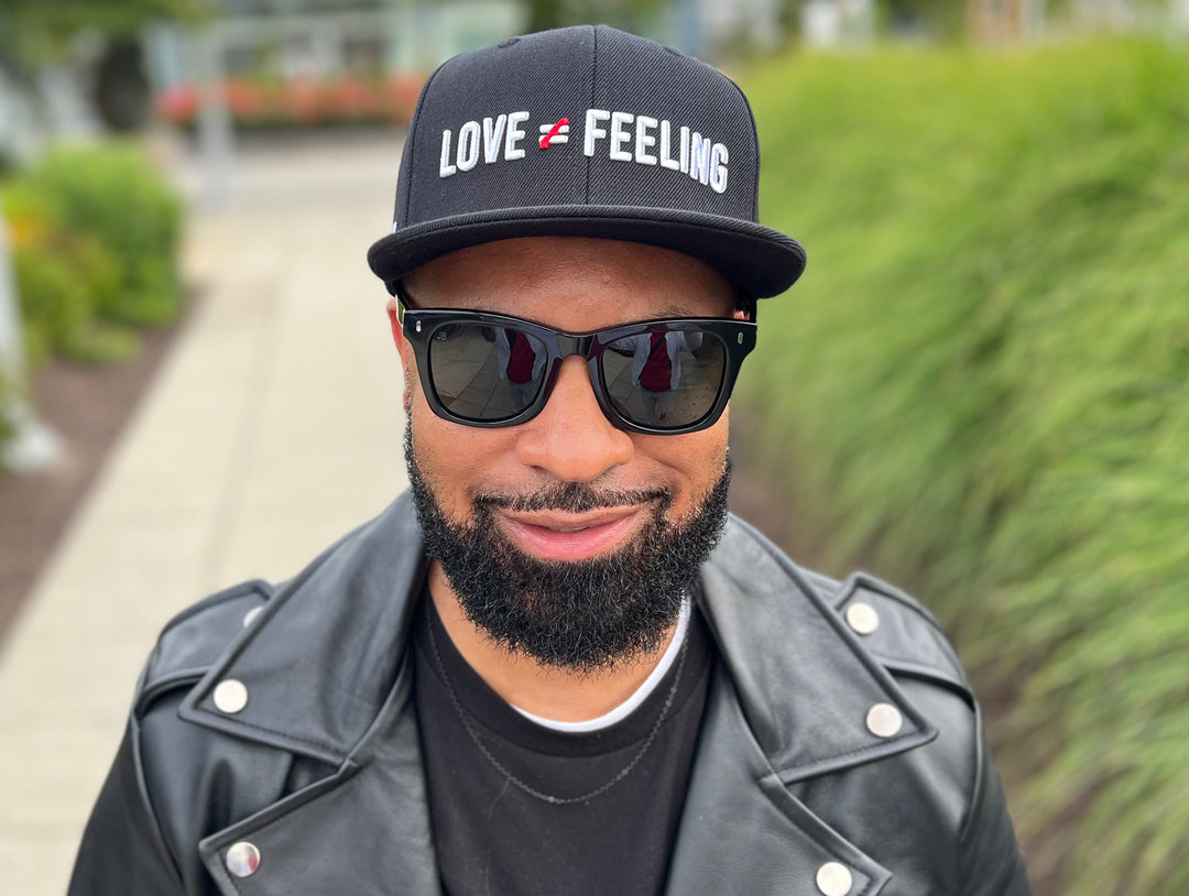 Love is Not a Feeling Snapback Cap - Black