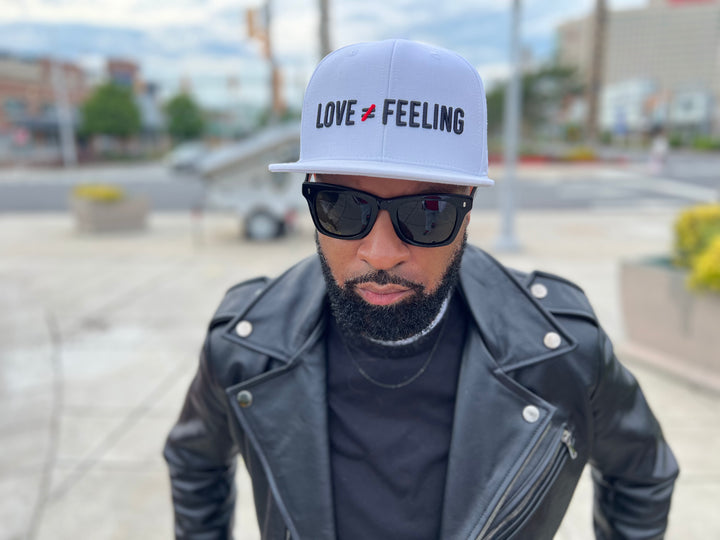 Love is Not a Feeling Snapback Cap - White
