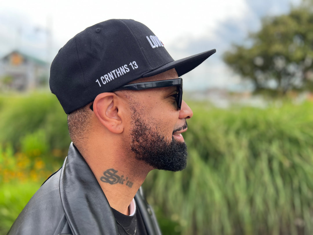 Love is Not a Feeling Snapback Cap - Black